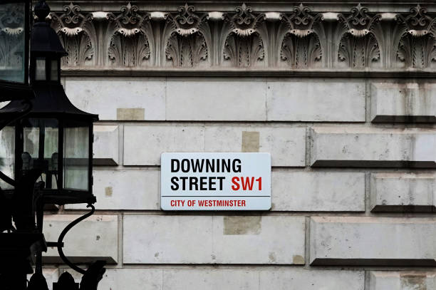 Downing Street sign on the wall in Westminster, London. London, UK - June 24, 2022: Downing Street sign on the wall of a building in London, UK. chancellor photos stock pictures, royalty-free photos & images