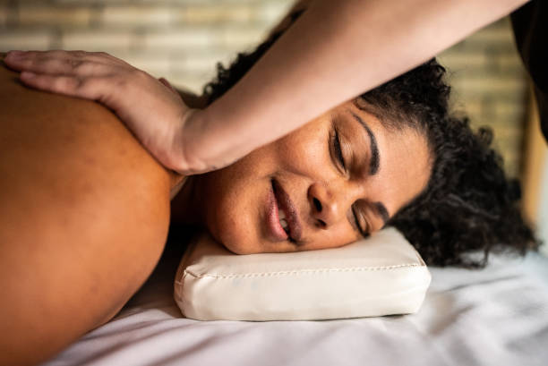 istock Woman receiving massage in a spa 1415615036