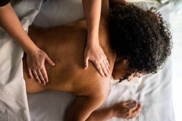 istock Woman receiving massage in a spa 1415615058