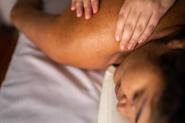 istock Woman receiving massage in a spa 1415615066