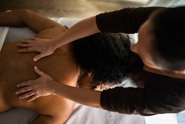 istock Woman receiving massage in a spa 1415615092