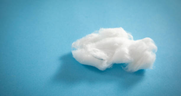 istock Cotton on the blue background. 1415617939