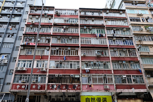 Old residential building in Yau Ma Tei district, Kowloon peninsula. \nHong Kong