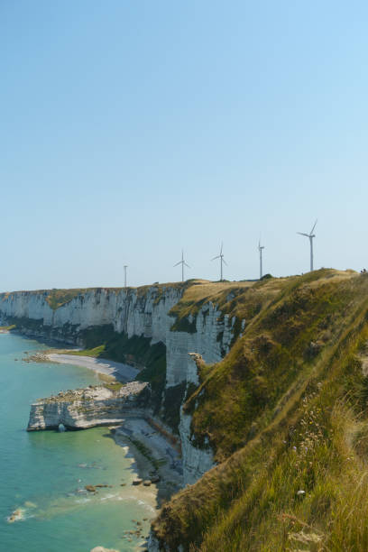 istock Coastal landscape with wind turbines 1415618978
