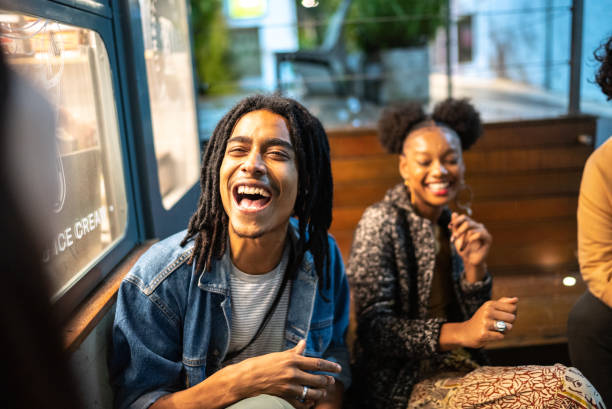 istock Friends having fun outdoors at night 1415619369