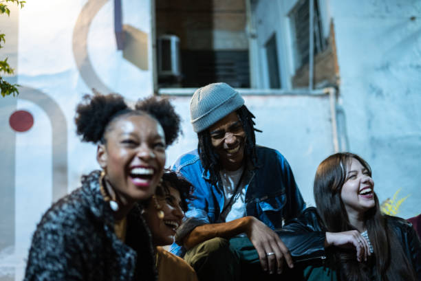 istock Friends having fun outdoors at night 1415619840