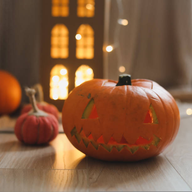 istock halloween and autumn cozy composition with pumpkins, october home decoration 1415619957