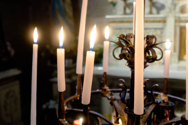 istock Bright candles in a church 1415619968
