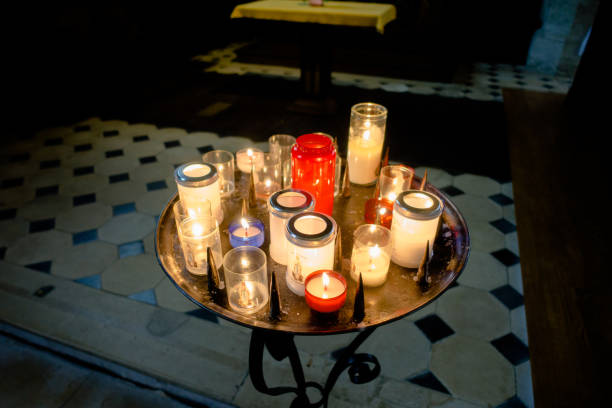 istock Bright candles in a church 1415619972