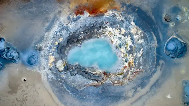 Photo of Looking down on a large mud pot at Gunnuhver area, Iceland - stock photo