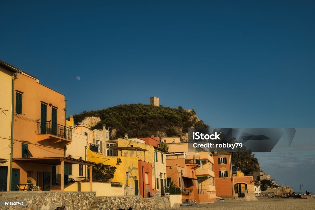the Etruscan village of Varigotti with its characteristic yellow colored houses the Etruscan village of Varigotti with its characteristic yellow colored houses photographed along the Mediterranean coast Architecture Stock Photo