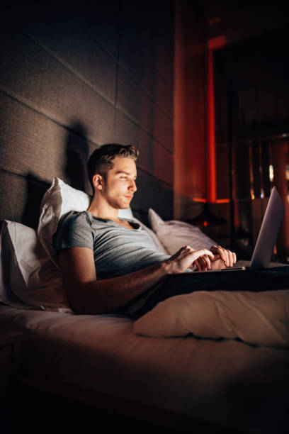 istock business man working in the hotel room 1415624611