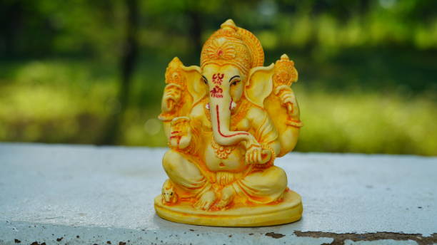 istock Eco friendly Ganesh or Ganpati idol or murti with nature background, home made. selective focus. Ganesha chaturthi festival 2022. 1415627010