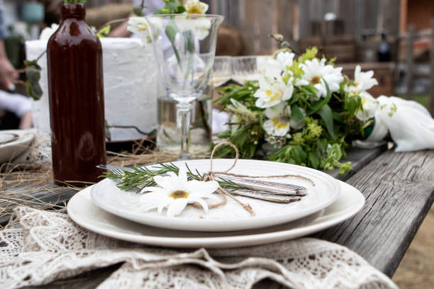 istock set table at a rural wedding. cutlery, plates and glasses 1415628665