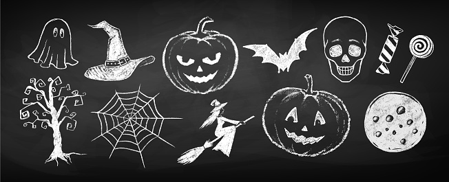 Halloween chalk doodles drawings collection on chalkboard background