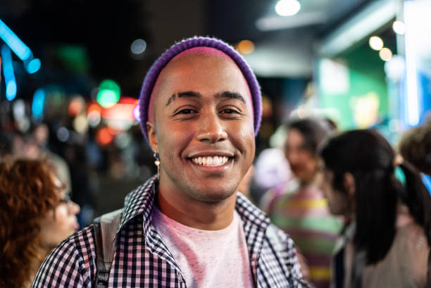 istock Portrait of a young man outdoors at night 1415631154