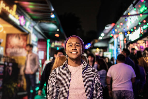 istock Portrait of a young man outdoors at night 1415631274