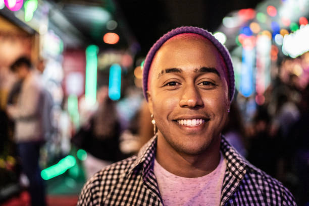 istock Portrait of a young man outdoors at night 1415631290