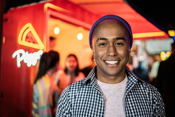 istock Portrait of a young man outdoors at night 1415631345
