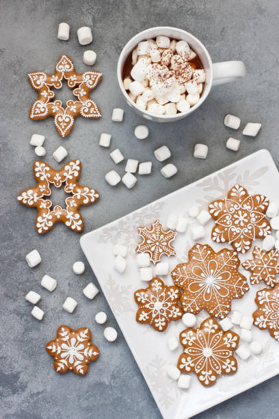 istock Christmas time composition with mug with  hot chocolate and gingerbread cookies, top view 1415631469