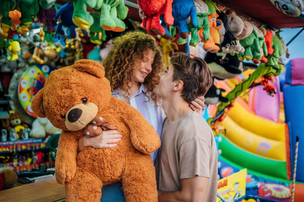 istock Winning a target shooting game at the funfair 1415633825