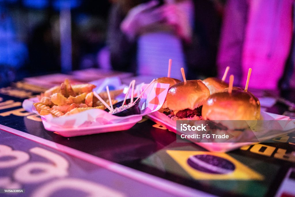 Hamburguer and french fries on top of a table Brazil Stock Photo