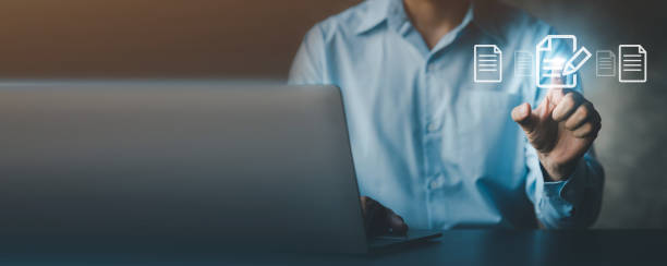 istock business man with holograms of digital document files, data files on computers stored as cloud databases can be viewed online and prevented data loss from the device. Data file management concept. 1415634171