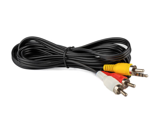 istock Twisted black cable with RCA connectors for analog signal transmission. 1415636802