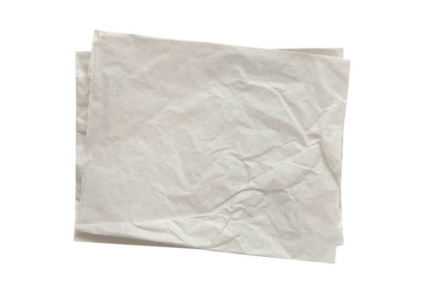istock Grey kitchen bakery paper pieces top view isolated on white.Food serving dish. 1415638477