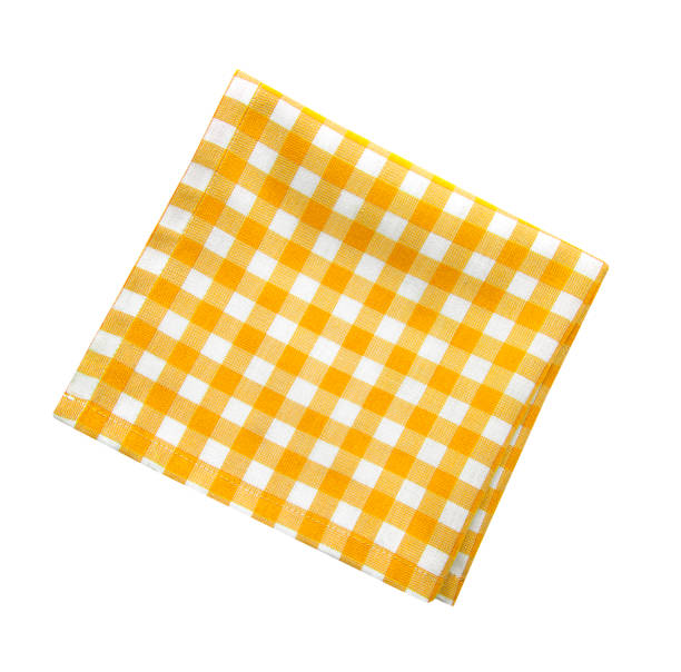 Yellow checkered folded cloth isolated,gingham checked kitchen towel,picnic decor element.