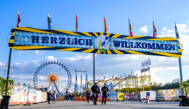 spring festival in munich - germany - amusement park oktoberfest munich chain swing ride imagens e fotografias de stock