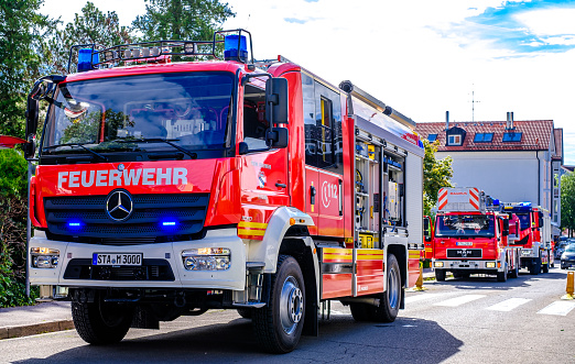 Tutzing, Germany - July 9: typical german fire department truck at the old town in Tutzing on July 9, 2022