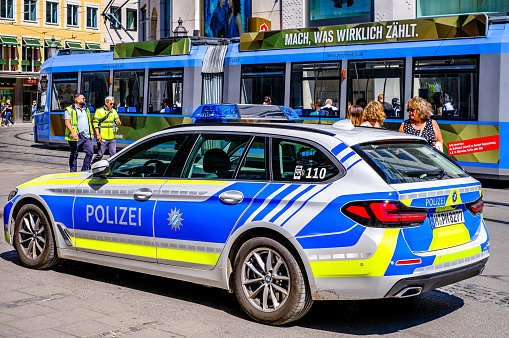 Munich, Germany - May 15: typical german police car at the old town of munich on May 15, 2022