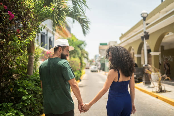 istock Young couple walking at the historic district 1415642873