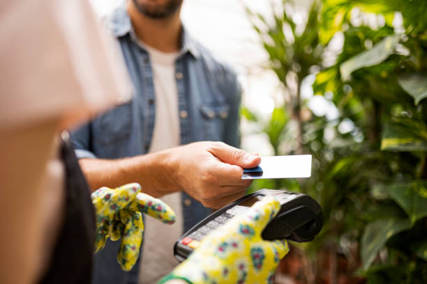istock Credit card purchase in a garden center 1415644299