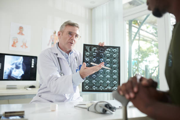 istock Serious Doctor Talking to Military Man 1415644359