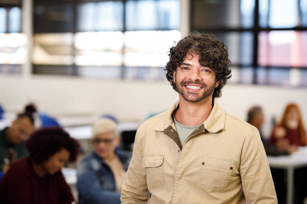 istock Smily professor in front of class 1415644394