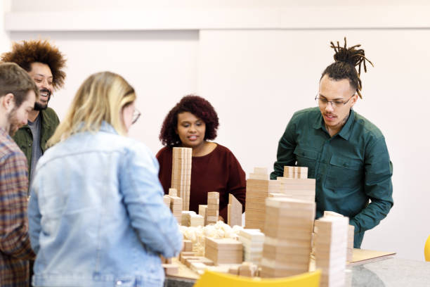 istock Students taking a look at their city model 1415644455