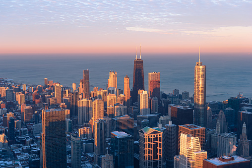 Cityscape aerial view of Chicago from observation deck at sunset.