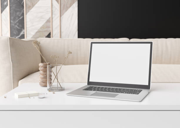 istock Laptop with blank white screen, on white table at home. Computer mock up. Free, copy space for app, game, web site presentation. Empty laptop screen ready for your design. Modern interior. 3D render. 1415661842