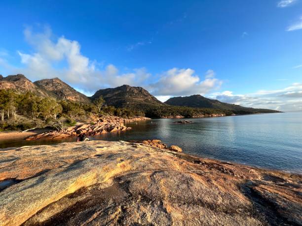 Honeymoon Bay, Freycinet, Tasmania Quiet sunny winter evening along the Honeymoon Bay honeymoon bay stock pictures, royalty-free photos & images