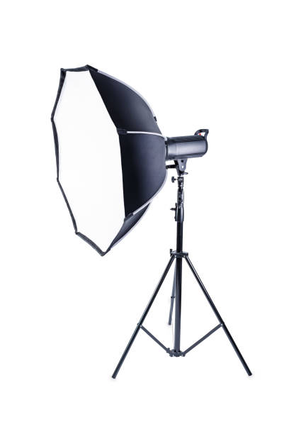 istock Flash on a tripod with a nozzle on a white isolated background 1415664291