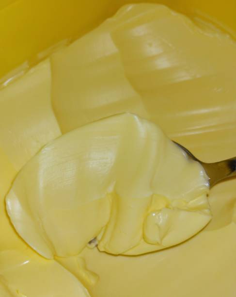 spoonful of butter - baking margarine studio shot macro imagens e fotografias de stock