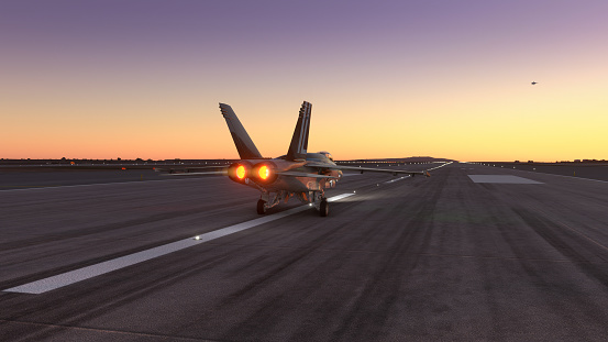 Militar aircraft prepare to take off over the amazing sunset.