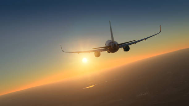 istock Comercial aircraft flying over amazing clean sunset. 1415680735