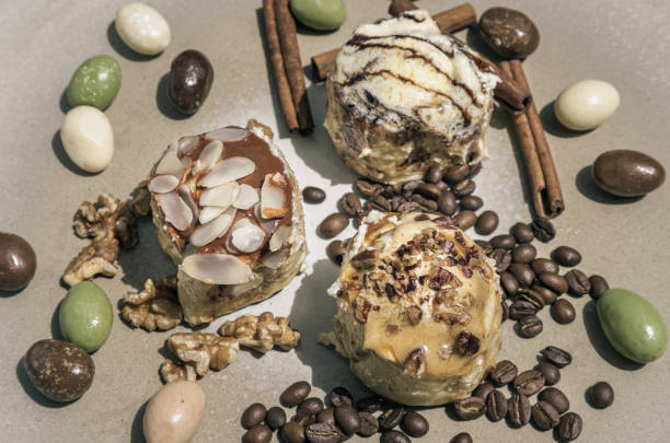 istock Bakery, Stick cookies, Walnuts, Colored eggs and Roasted coffee beans with Cinnamon on Ceramic background. Selective focus. 1415683495