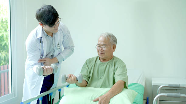 istock Physical therapy in elder people. 1415692215