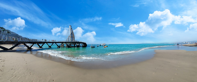 Playa De Los Muertos beach and pier near Puerto Vallarta Malecon, the city largest public beach.