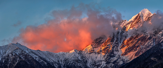 Himalayan mountain peaks in the sunset glow of Nyingchi City, Tibet