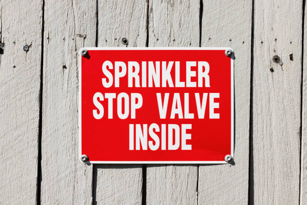 istock Sprinkler stop valve sign. 1415696072